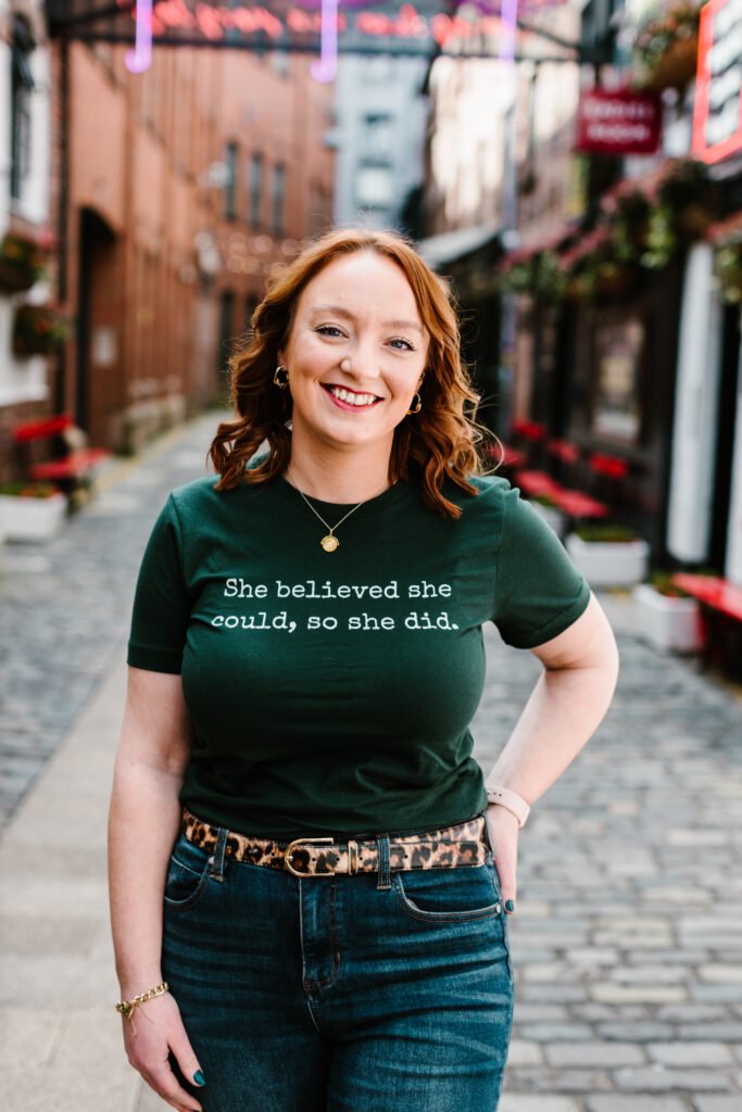 Millennial Woman Wearing T-Shirt Saying She Believed She Could So She Did  